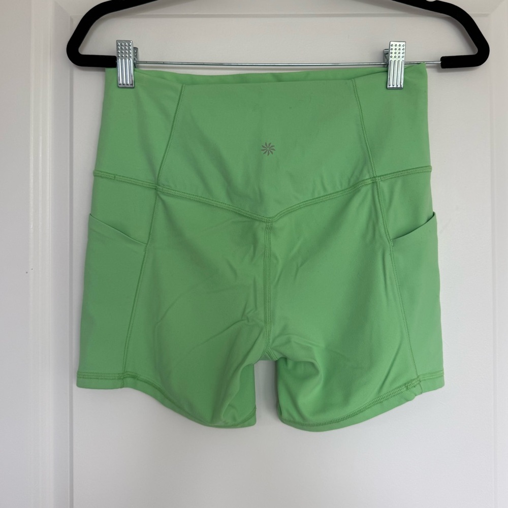 Athleta Salutation Stash Pocket II 5 inch shorts in Lime Green size Medium - Picture 3 of 5